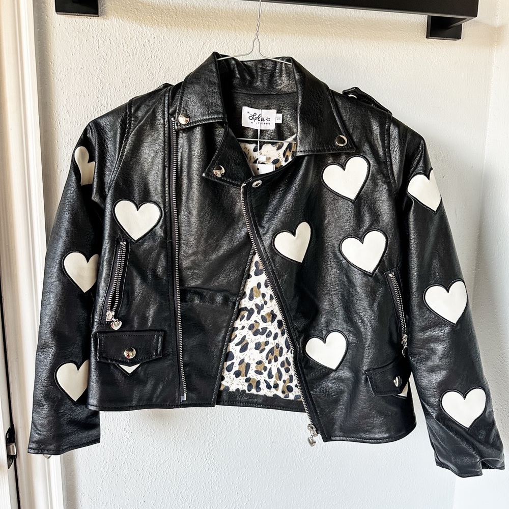 Brand new Lola and the boys black vegan leather moto jacket with white hearts
